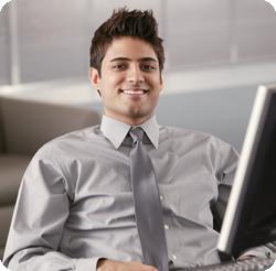 Happy man at the computer